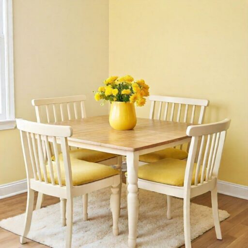 Cream walls with a soft yellow accent wall in breakfast nook