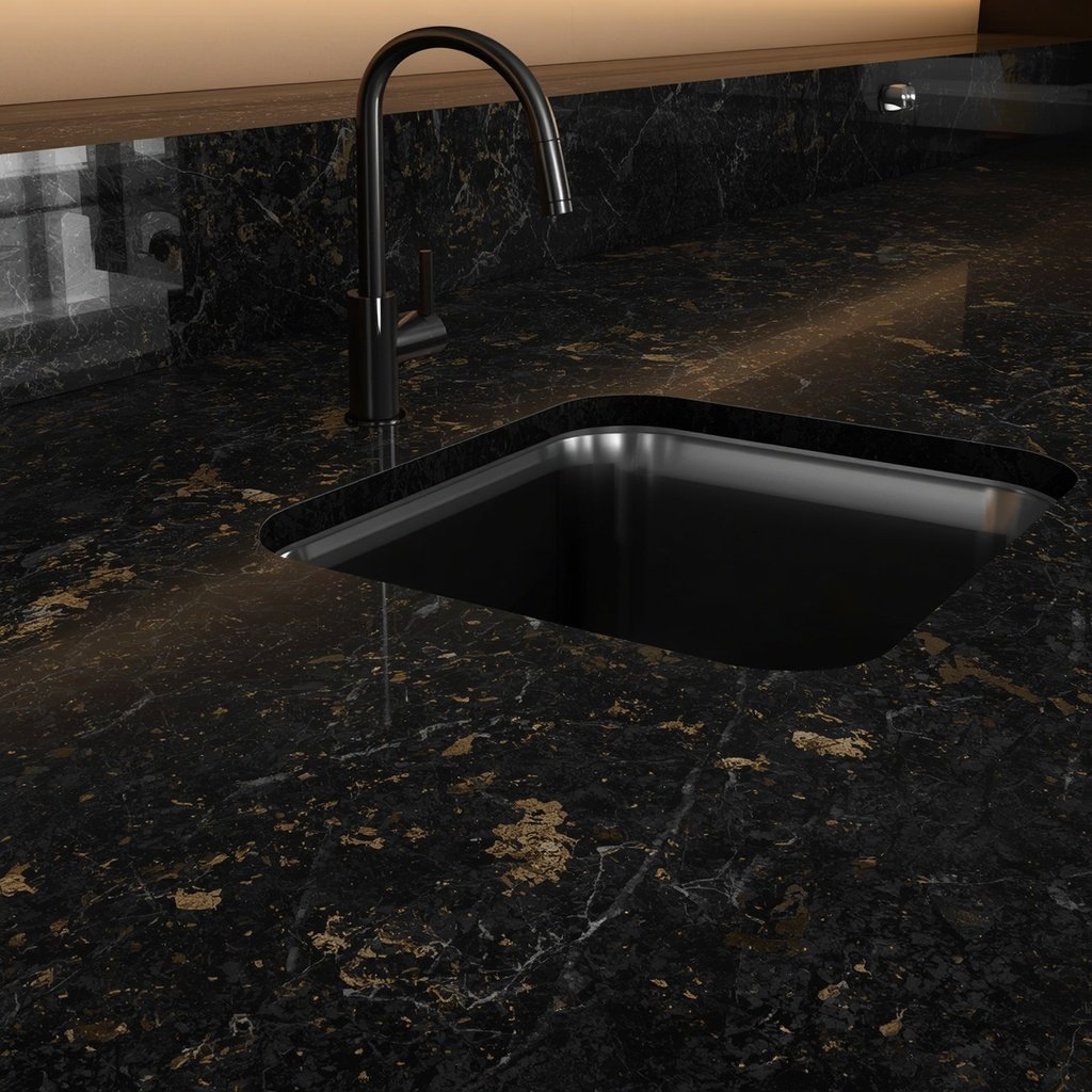 Dark granite countertop in modern Pakistani kitchen design